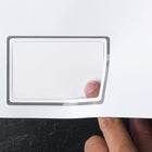 LMC1301 Membership ID Cards for Printers close up. 13-mil synthetic card on 100# text. Embedded card perfs out of paper.